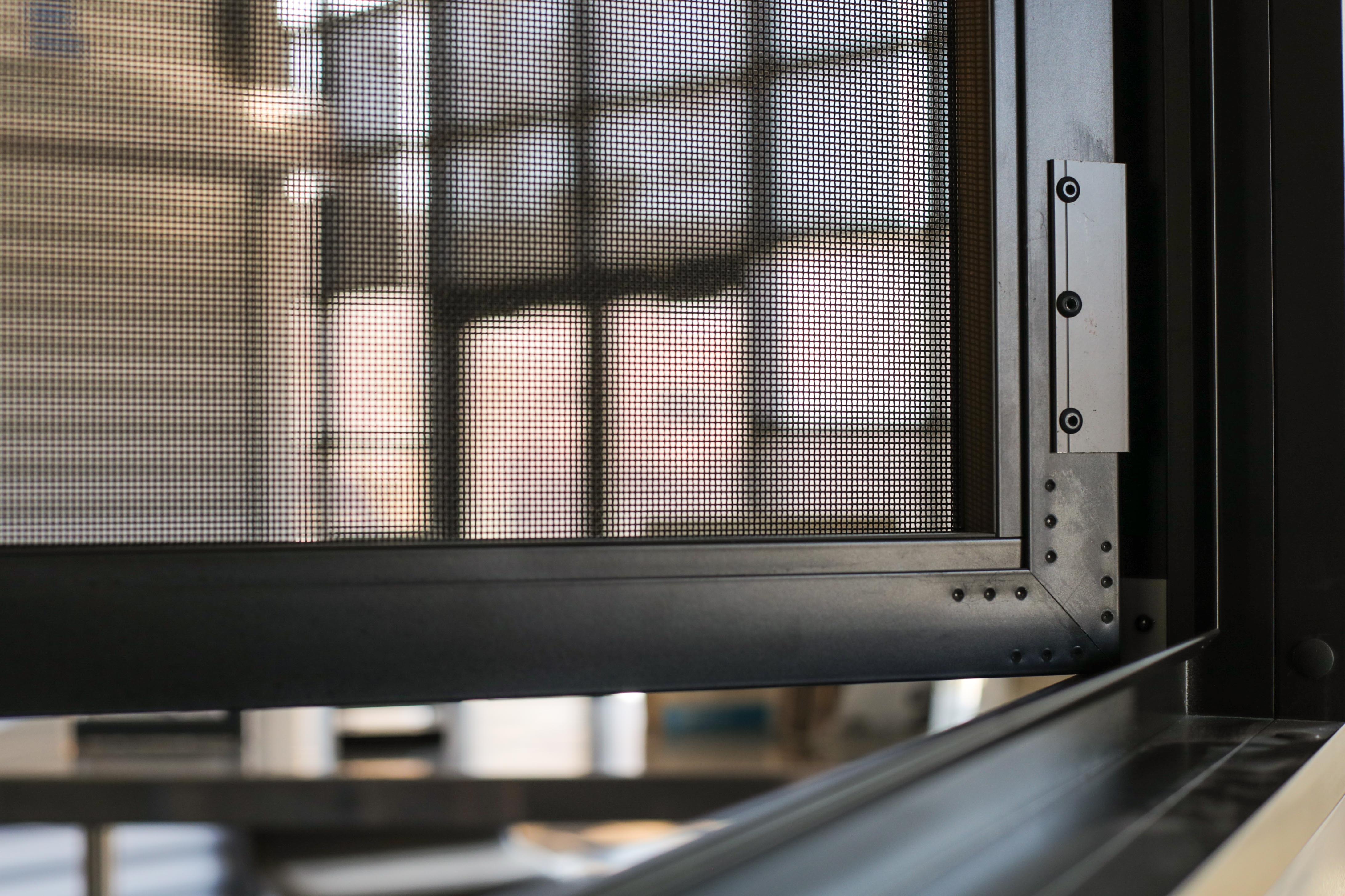 an operable egress home security screen shown close up