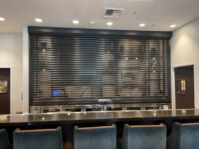 hotel bar security after adding shutters front view