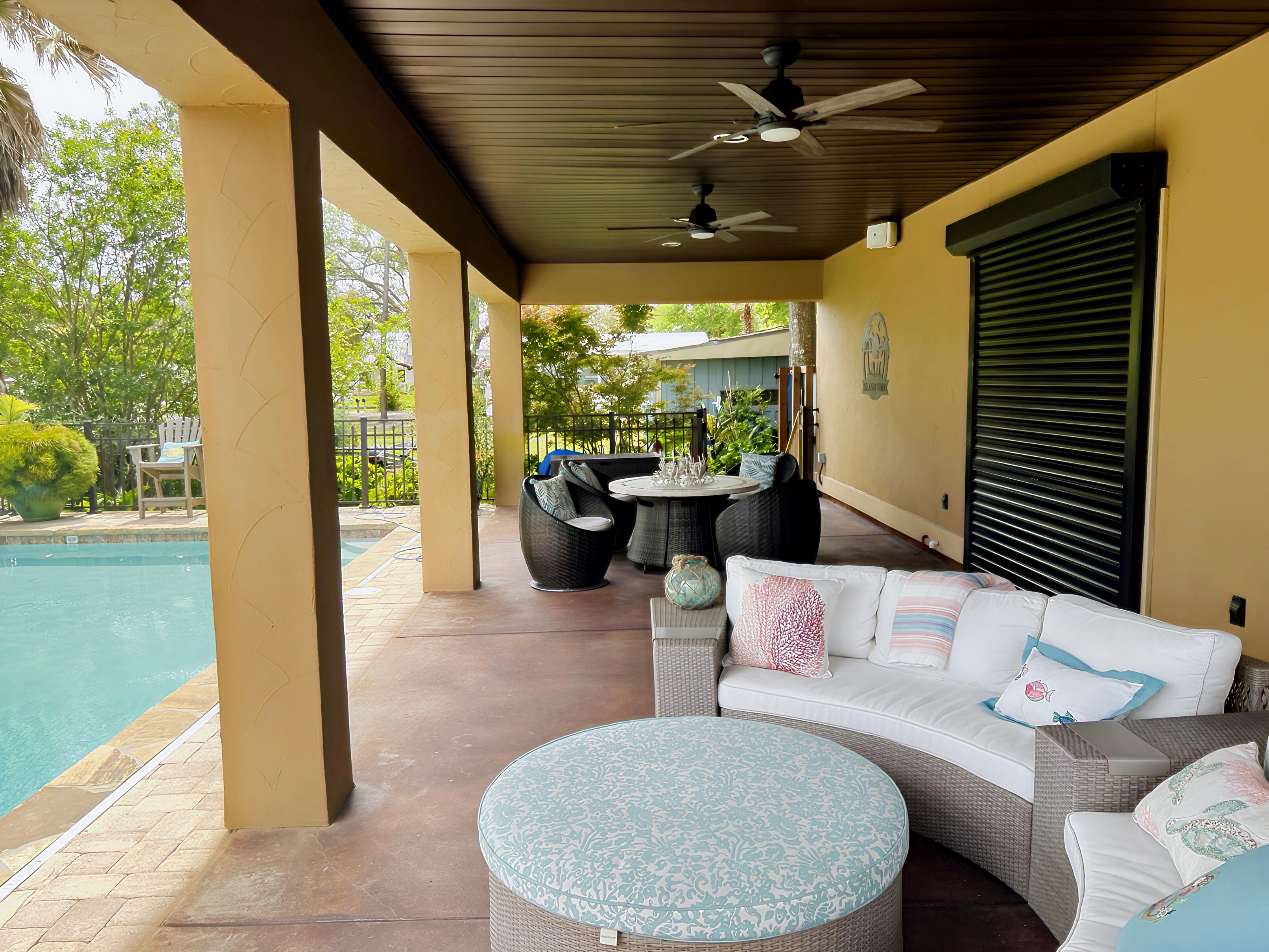 hurricane shutters protecting the back patio of a home in Alabama