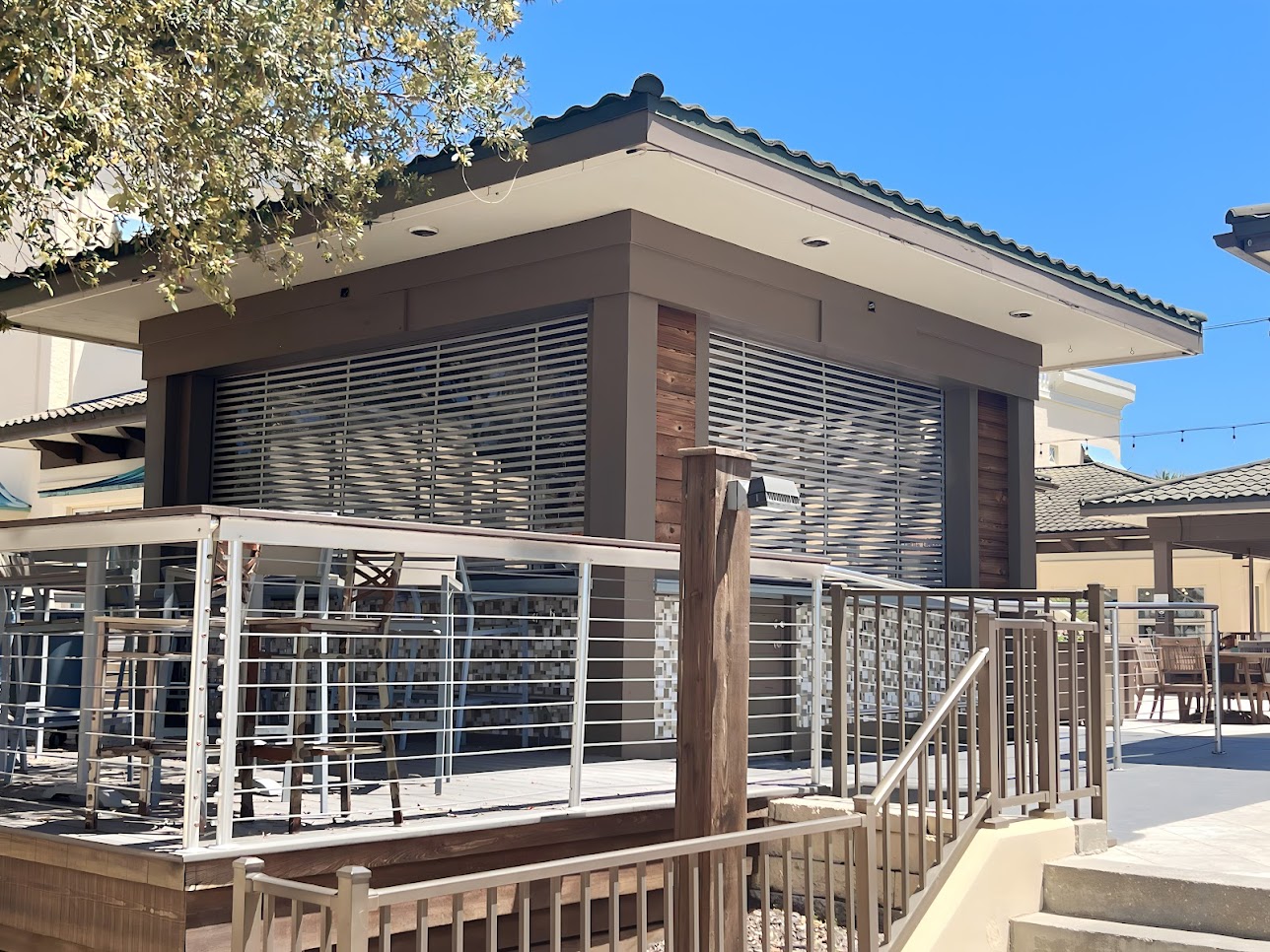 clear security shutters at an outdoor bar