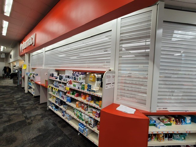 Perforated Security Shutters Protect a Pharmacy Counter