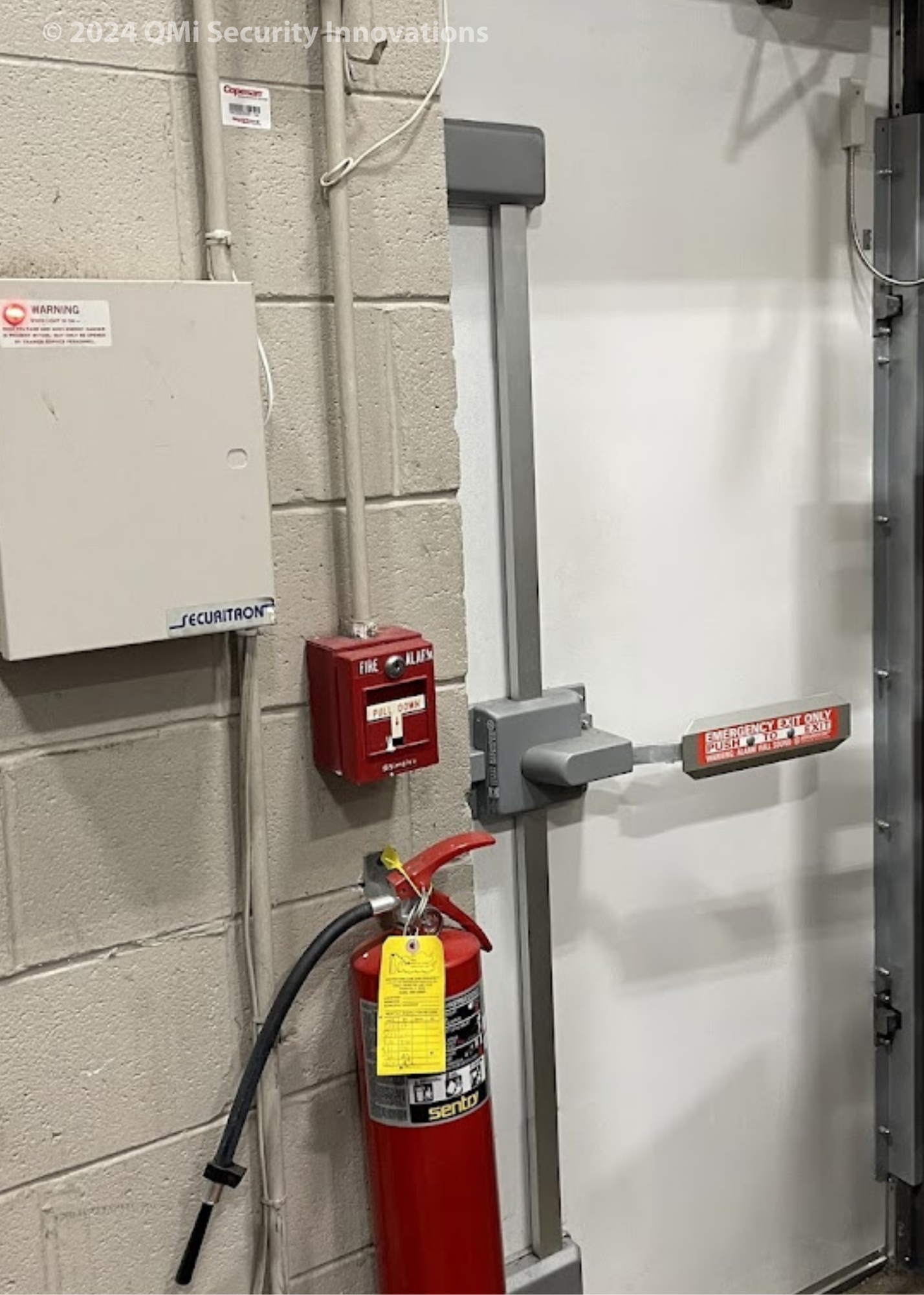 an electronics store in downtown Chicago uses a High-security door to protect a side exit